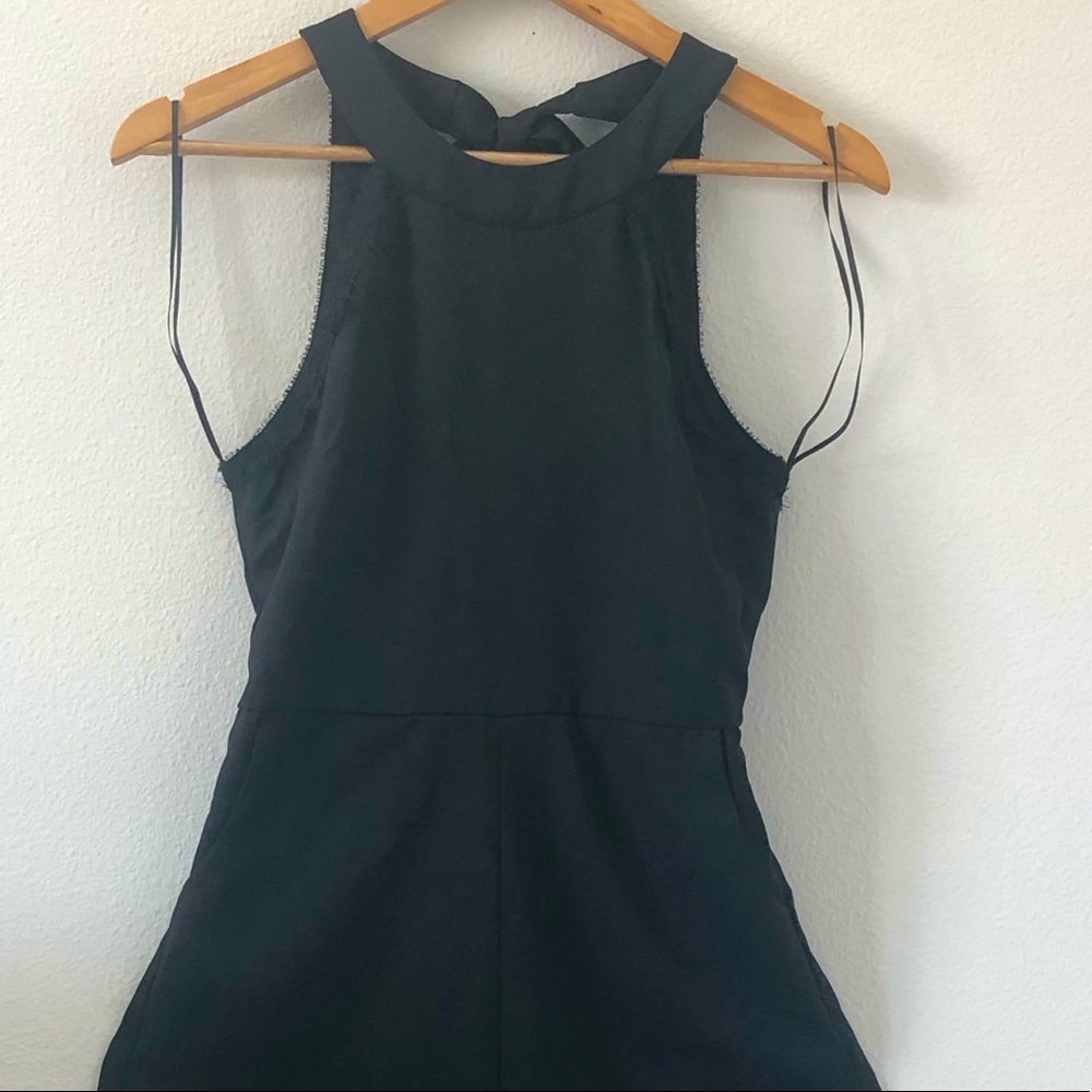 Francesca’s jumpsuit lace details
